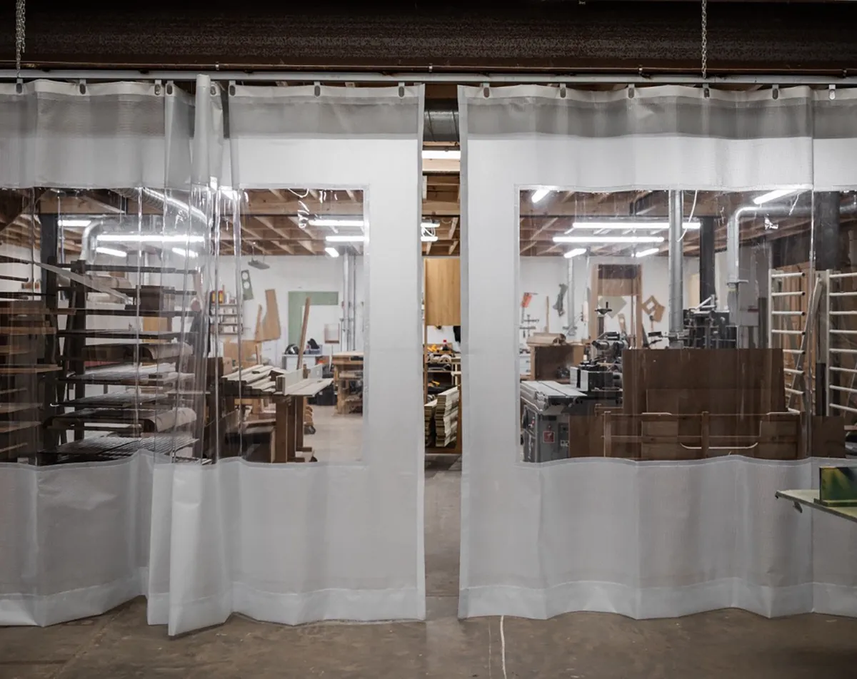 The Newport workshop seen through its clear dust curtains